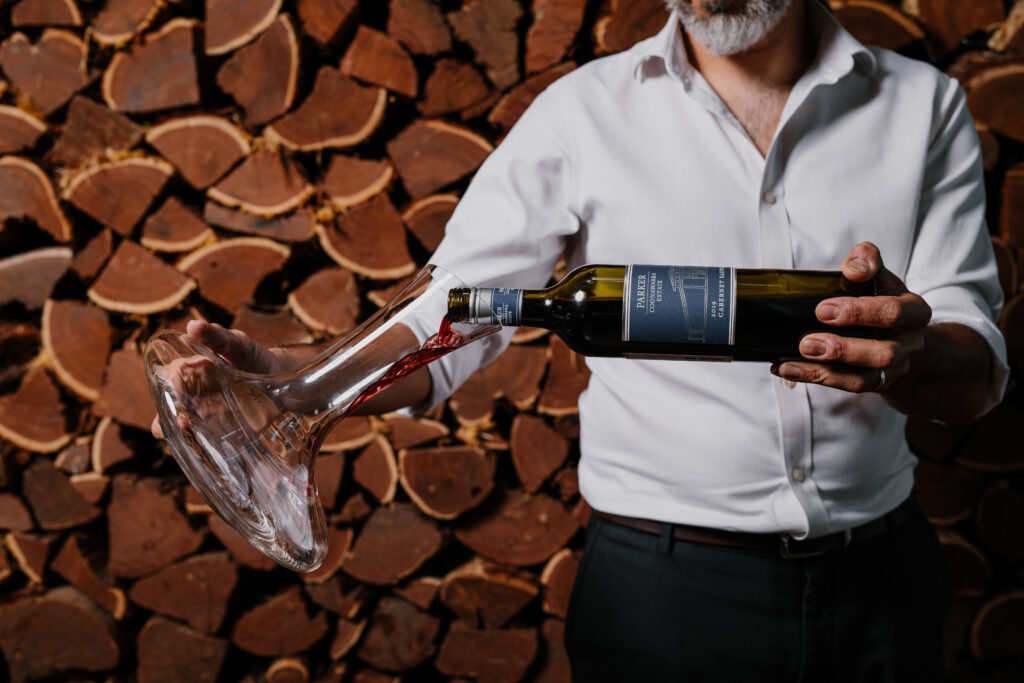 Wine being poured into a decanter